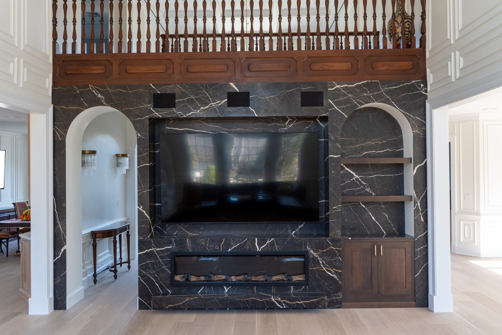 Black marble feature wall fireplace surround in New York City