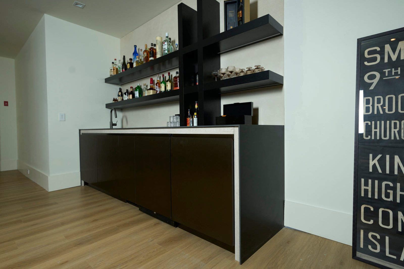Black porcelain bar countertop floating shelves