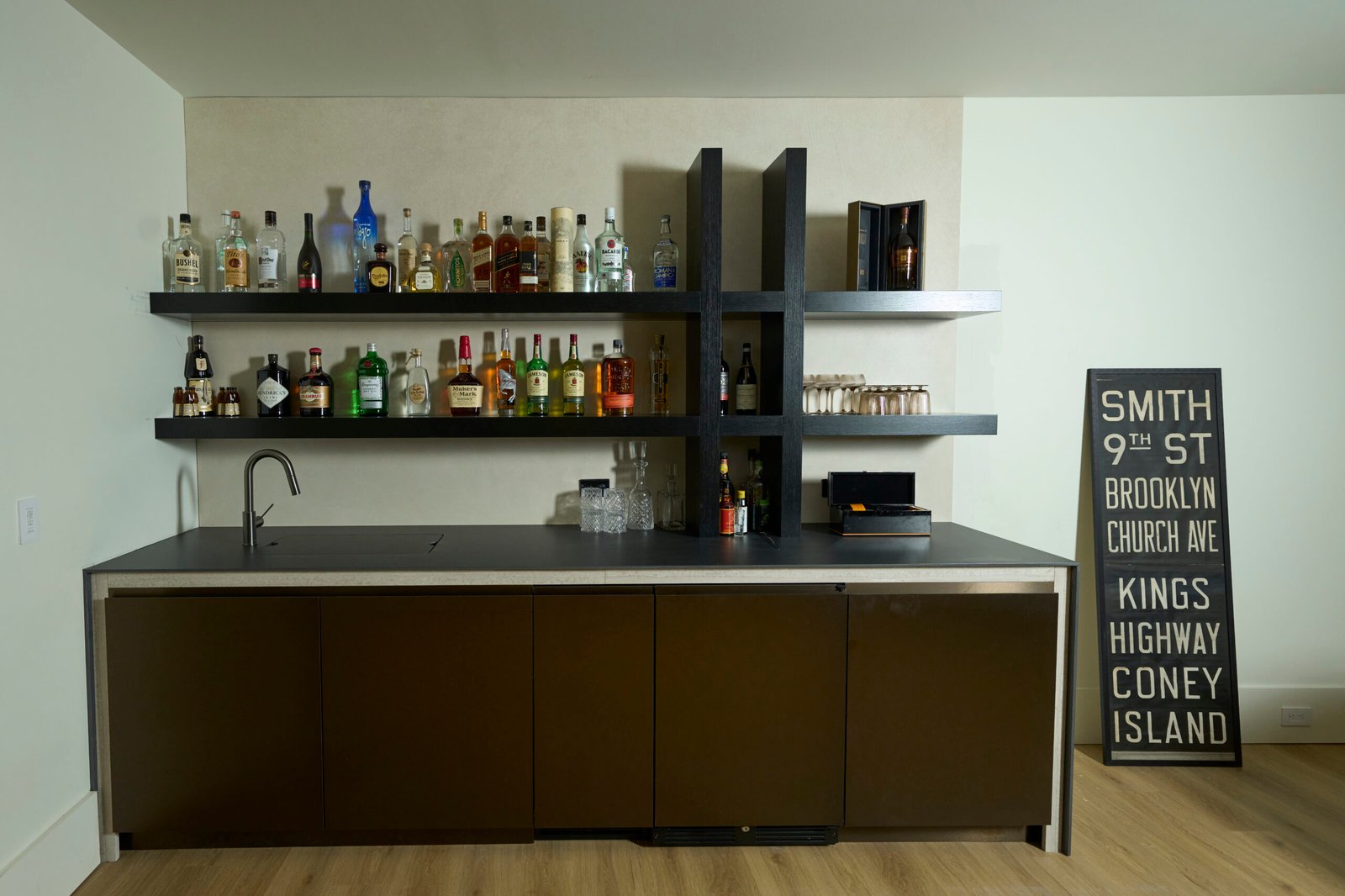 Black porcelain bar countertop dark cabinets