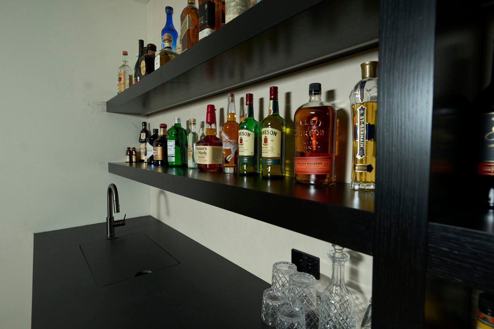 Black porcelain bar countertop whiskey shelf