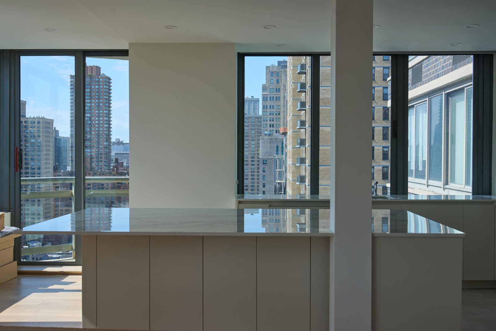 Dekton polished veined white island countertop