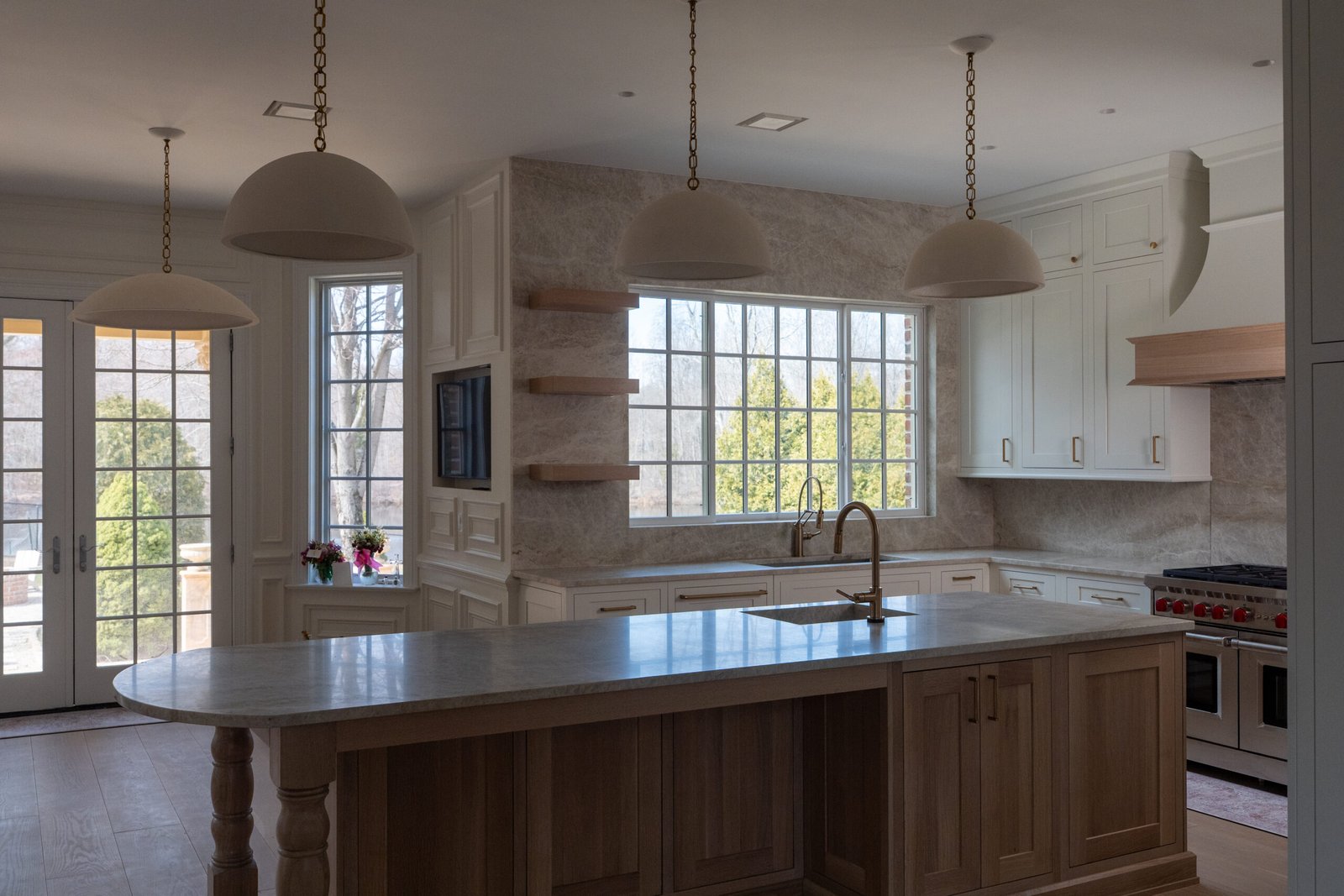Marble rounded island countertop open plan kitchen