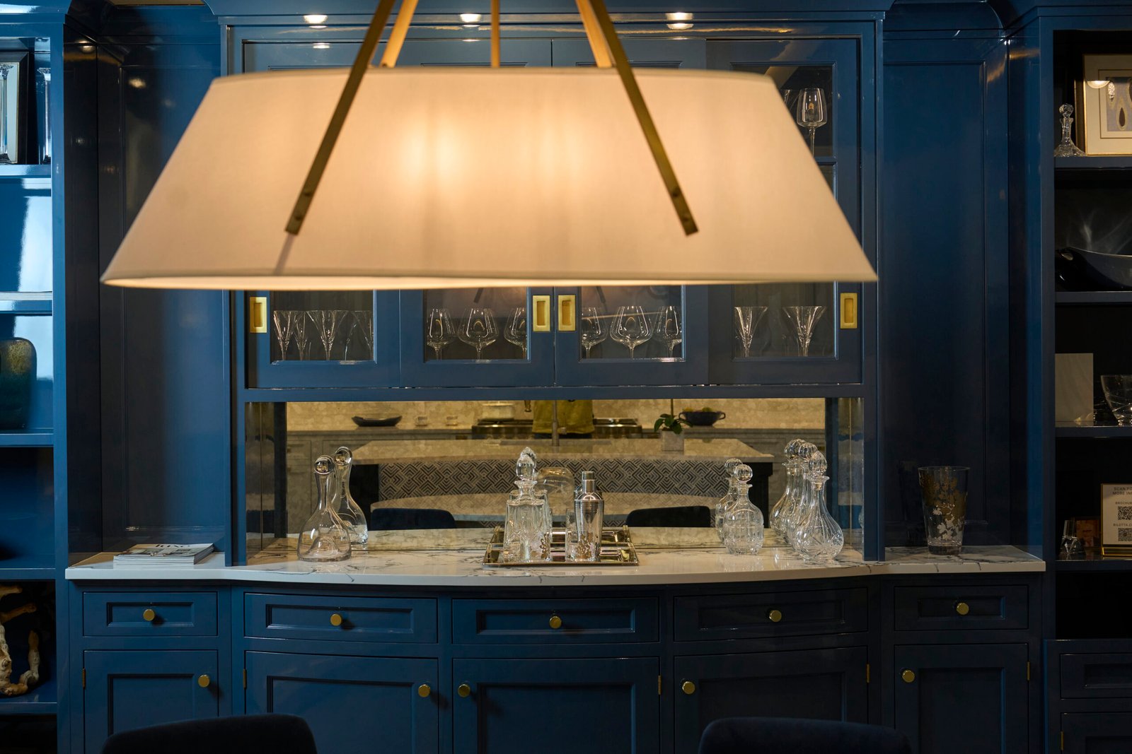 Quartz bar countertop blue cabinetry