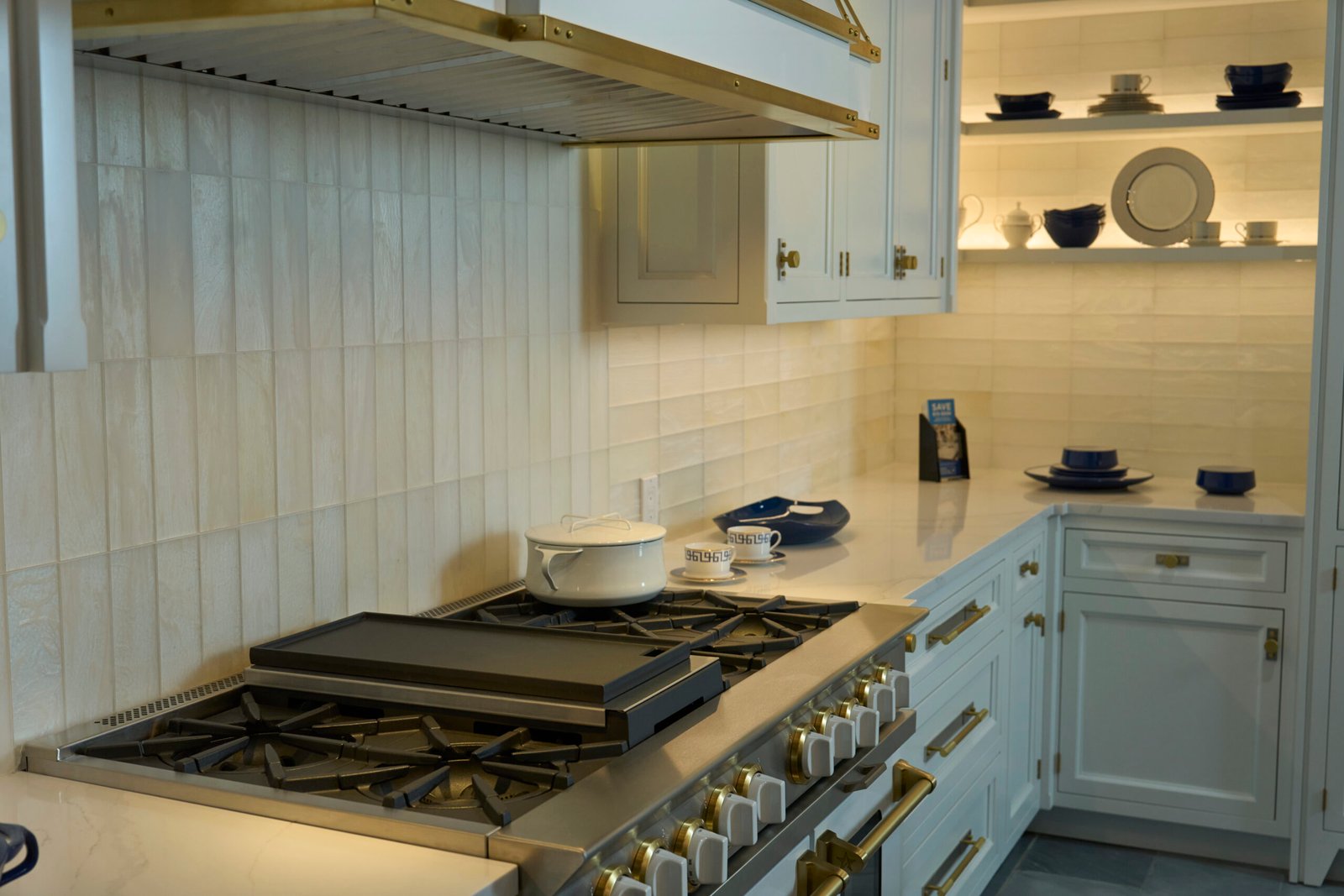 Quartz countertop stone backsplash gas range
