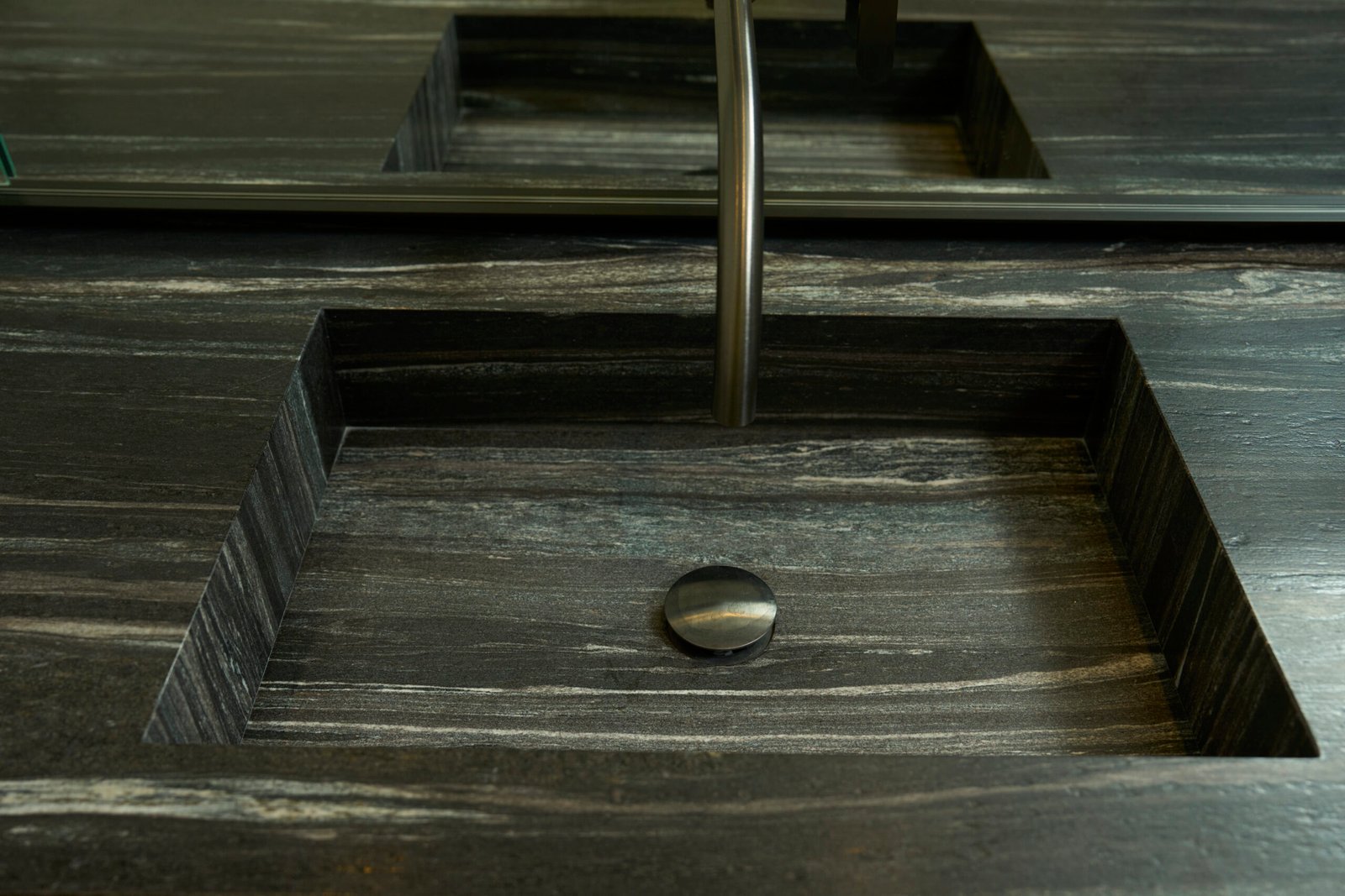 Natural stone dark integrated sink countertop