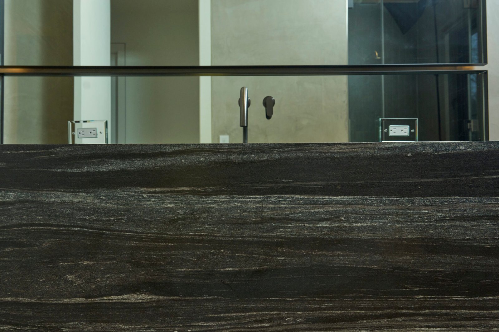 Natural stone dark vanity countertop waterfall edge