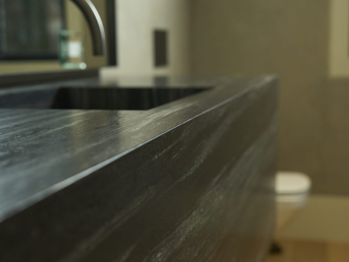 Integrated stone sink